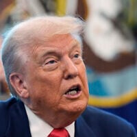 US President Donald Trump speaks during an event in the Oval Office to mark the 90th anniversary of the Social Security Act, August 14, 2025, in Washington. (AP Photo/Alex Brandon)