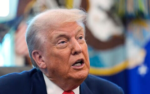 US President Donald Trump speaks during an event in the Oval Office to mark the 90th anniversary of the Social Security Act, August 14, 2025, in Washington. (AP Photo/Alex Brandon)