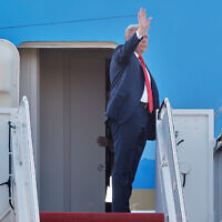 US President Donald Trump waves as he boards Air Force One at Joint Base Andrews, Md., Friday, Aug. 15, 2025, en route to a meeting with Russian President Vladimir Putin in Alaska. (AP Photo/Luis M. Alvarez)
