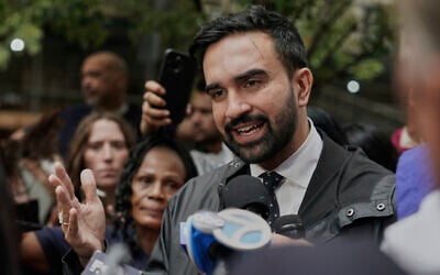New York mayoral candidate Zohran Mamdani speaks at a rally with Hotel and Gaming Trades Council workers, in New York, August 20, 2025. (AP Photo/Richard Drew)