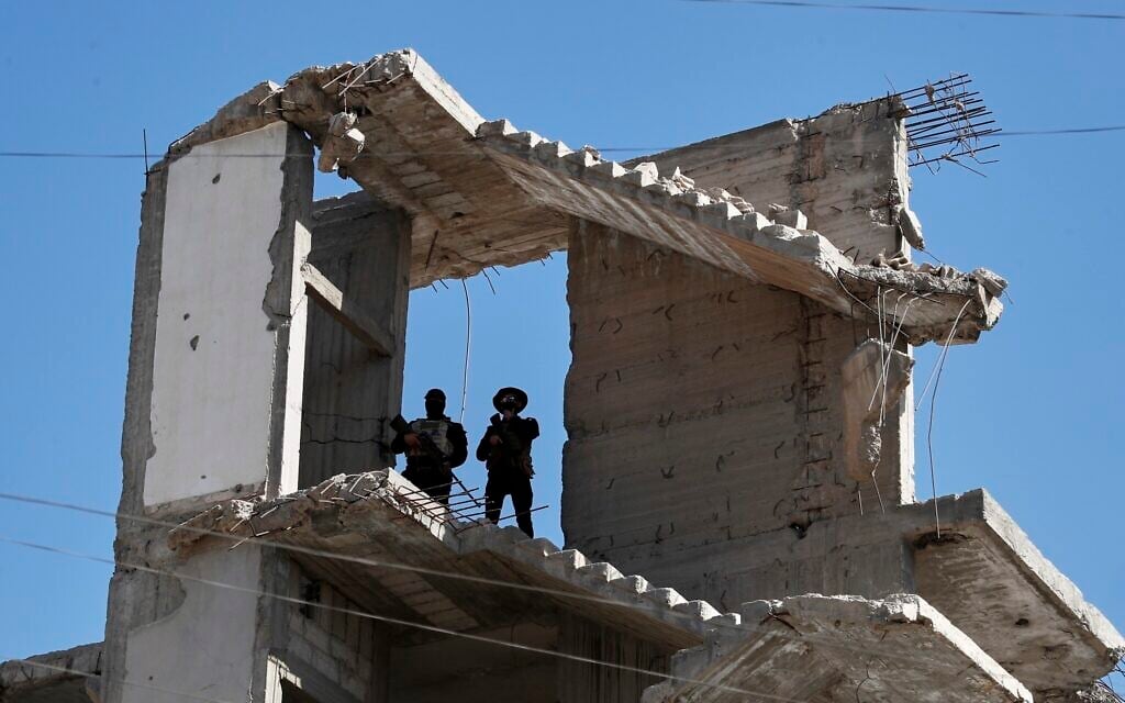 Syria reports fresh Israeli strike, raid by helicopter-borne troops in Damascus area