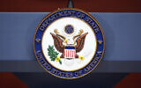 FILE - The seal of the US State Department is photographed at the Washington Passport Agency, July 12, 2016, in Washington. (AP/Alex Brandon)