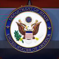 FILE - The seal of the US State Department is photographed at the Washington Passport Agency, July 12, 2016, in Washington. (AP/Alex Brandon)