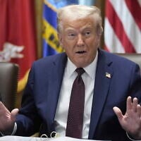 US President Donald Trump speaks during a cabinet meeting, August 26, 2025, at the White House in Washington. (AP Photo/Mark Schiefelbein)