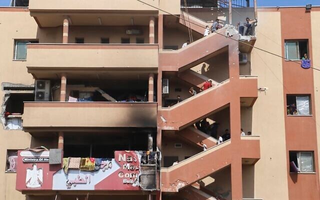 People walk up the stairs to the site of an Israeli strike, minutes before a second strike hit the same spot, killing at least 22 people in total, including five journalists, at Nasser Hospital in Khan Younis, southern Gaza Strip, August 25, 2025. This was one of the last photos taken by journalist Mariam Dagga, who freelanced for The Associated Press and other outlets, before she walked to the site and was killed in the second strike. (AP Photo/Mariam Dagga) People walk up the stairs to the site of an Israeli strike, minutes before a second strike hit the same spot, killing at least 22 people in total, including five journalists, at Nasser Hospital in Khan Younis, southern Gaza Strip, August 25, 2025. This was one of the last photos taken by journalist Mariam Dagga, who freelanced for The Associated Press and other outlets, before she walked to the site and was killed in the second strike. (AP Photo/Mariam Dagga)