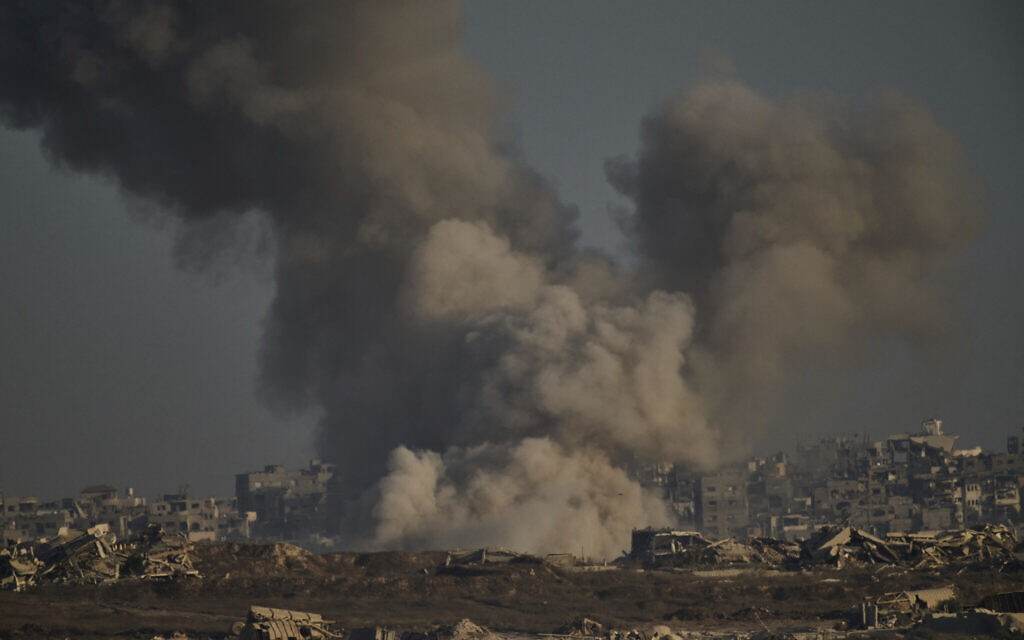 Smoke rises to the sky following an Israeli military strike in the northern Gaza Strip, as seen from southern Israel, Aug. 30, 2025. (AP Photo/Leo Correa)