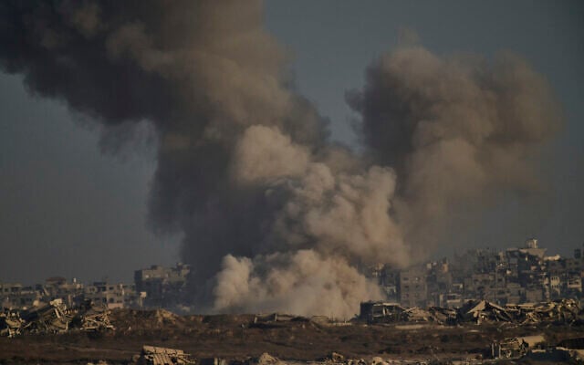 Smoke rises to the sky following an Israeli military strike in the northern Gaza Strip, as seen from southern Israel, Aug. 30, 2025. (AP Photo/Leo Correa)