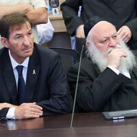 Likud MK Boaz Bismuth (left) and United Torah Judaism chairman Yitzhak Goldknopf (right) attend a meeting of the Knesset House Committee, August 4, 2025. (Dani Shem-Tov/ Office of the Knesset Spokesperson)