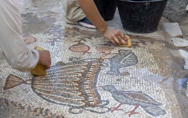Cleaning the mosaic. (Dr. Michael Eisenberg)