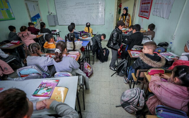 Arab students at the Noreen school, in the Jerusalem Arab neighborhood of Beit Hanina, on January 17, 2023. (Jamal Awad/Flash90) Arab students at the Noreen school, in the Jerusalem Arab neighborhood of Beit Hanina, on January 17, 2023. (Jamal Awad/Flash90)