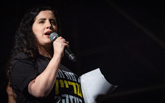 MK Naama Lazimi speaks during a protest against Prime Minister Benjamin Netanyahu and his government, near the Knesset in Jerusalem, March 31, 2025. (Yonatan Sindel/Flash90)