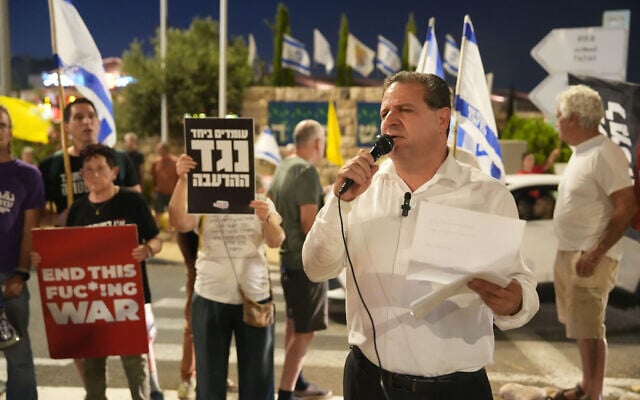 MK Ayman Odeh speaks with activists at a protest calling for an end to the war in Gaza, and the return of the hostages, in Rosh Pina, northern Israel, on July 26, 2025.(Ayal Margolin/FLASH90)