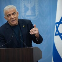 Opposition Leader Yair Lapid leads a faction meeting at the Knesset, in Jerusalem, on August 4, 2025. (Yonatan Sindel/Flash90)