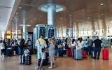 Illustrative: Travelers at Ben Gurion International Airport on July 21, 2025. (Nati Shohat/FLASH90)