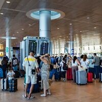 Illustrative: Travelers at Ben Gurion International Airport on July 21, 2025. (Nati Shohat/FLASH90)