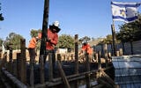 A ceremony marks rebuilding in Kibbutz Nir Oz, August 7, 2025, almost two years after the October 7 massacre. (Tsafrir Abayov/FLASH90)