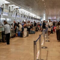 Passengers at Ben Gurion International airport near Tel Aviv, August 8, 2025.  (Rachel Alroey/Flash90)
