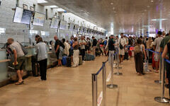 Passengers at Ben Gurion International airport near Tel Aviv, August 8, 2025.  (Rachel Alroey/Flash90)