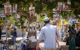 Visitors at Hostage Square in Tel Aviv. August 11, 2025. (Miriam Alster/ Flash90)
