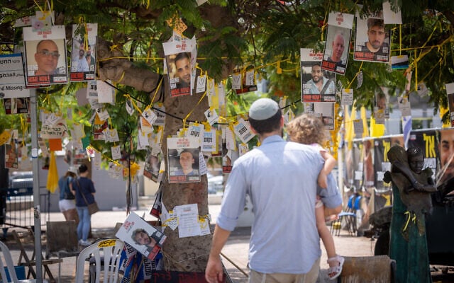 Visitors at Hostage Square in Tel Aviv. August 11, 2025. (Miriam Alster/ Flash90) Visitors at Hostage Square in Tel Aviv. August 11, 2025. (Miriam Alster/ Flash90)