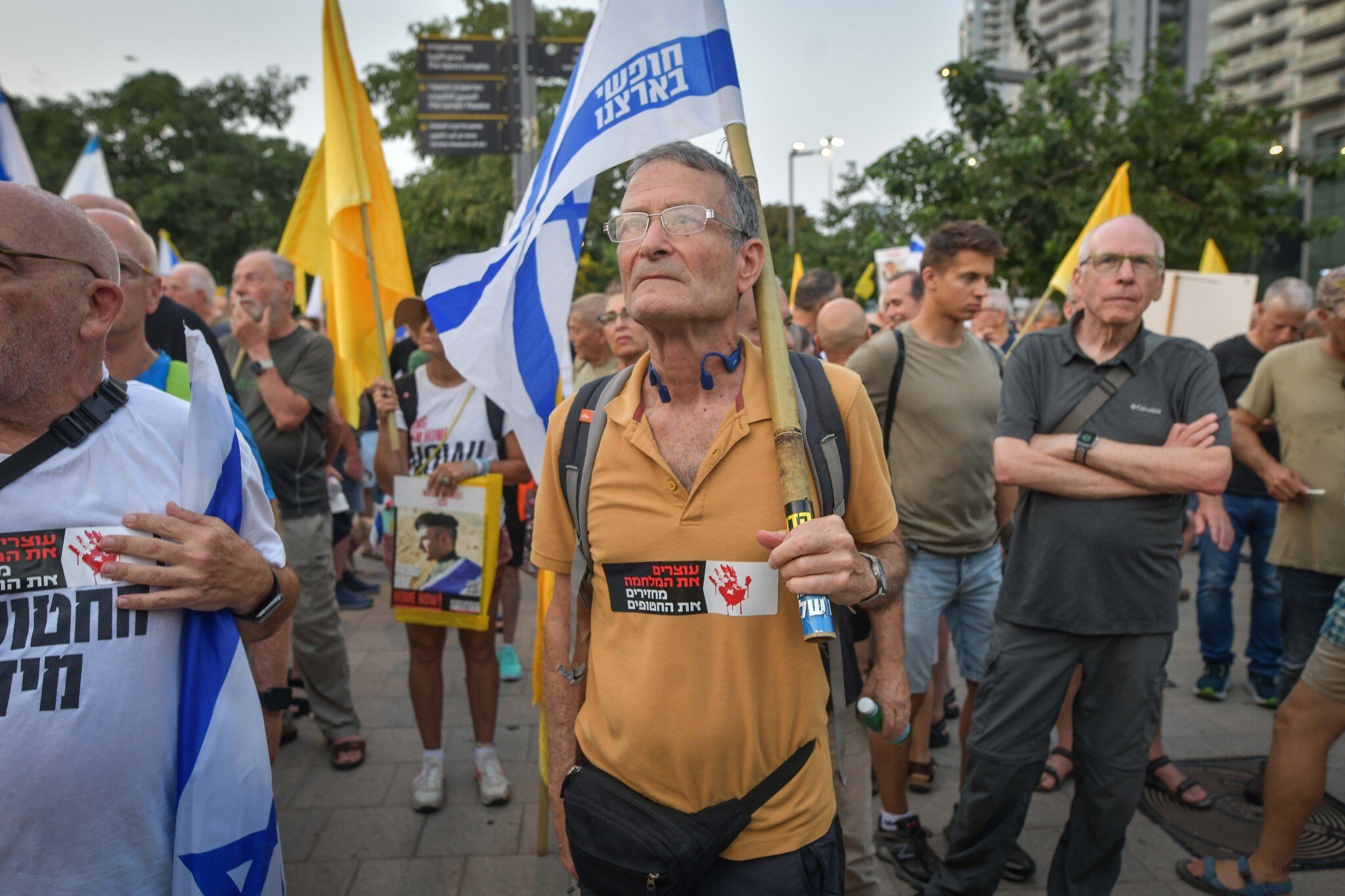 NextImg:Retired and reserve Air Force pilots rally by IDF headquarters to protest Gaza war
