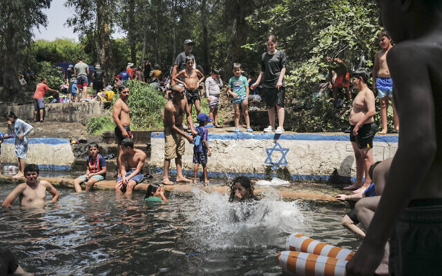 Israelis cool off at a swimming hole in the Golan Heights on August 12, 2025. (Michael Giladi/ Flash90) Israelis cool off at a swimming hole in the Golan Heights on August 12, 2025. (Michael Giladi/ Flash90)