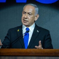 Prime Minister Benjamin Netanyahu speaks at a Newsmax event in Jerusalem, on August 13, 2025. (Shalev Shalom/POOL)
