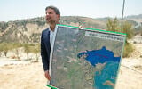 Finance Minister Bezalel Smotrich attends a press conference announcing his plans to approve more than 3,000 housing units in the  E1 settlement project between Jerusalem and Ma’ale Adumim on August 14, 2025. (Yonatan Sindel/Flash90)