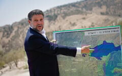 Finance Minister Bezalel Smotrich at a press conference announcing his plans to approve more than 3,000 housing units in the E1 settlement project between Jerusalem and Ma'ale Adumim on August 14, 2025. (Yonatan Sindel/FLASH90)
