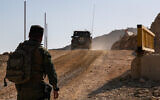 Illustrative: Israeli soldiers seen on the Syrian side of Mount Hermon, August 12, 2025. (Ayal Margolin/ Flash90)