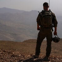 An Israeli soldier on the Syrian side of Mount Hermon, August 12, 2025. (Ayal Margolin/Flash90)