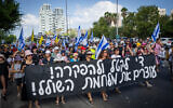 Protesters block a road in Tel Aviv during a protest calling for the release of the Israeli hostages held by Hamas in Gaza on August 17, 2025. (Erik Marmor/Flash90)