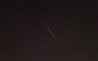 An interceptor missile is fired at a ballistic missile launched at Israel from Yemen, as seen from Jerusalem, August 22, 2025. (Yonatan Sindel/Flash90)