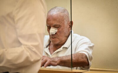 Asher Goldstein, who confessed to murdering his 5-year-old son in 1974, arrives for a court hearing in Eilat on August 24, 2025. (Yehuda Ben Itach/Flash90)