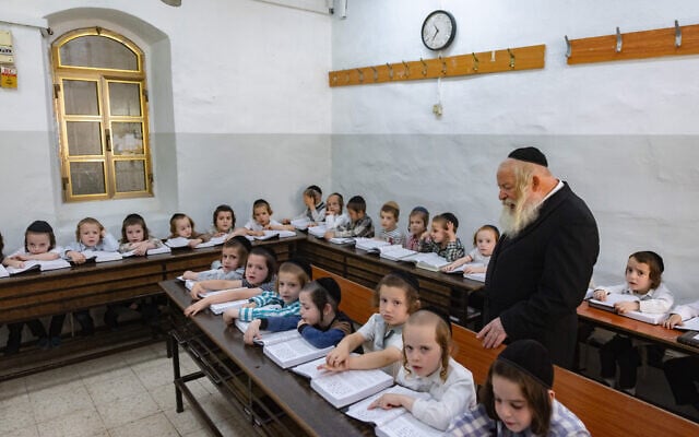 Young ultra-Orthodox students in their school in the Mea Shearim neighborhood of Jerusalem, on August 25, 2025. (Chaim Goldberg/Flash90)