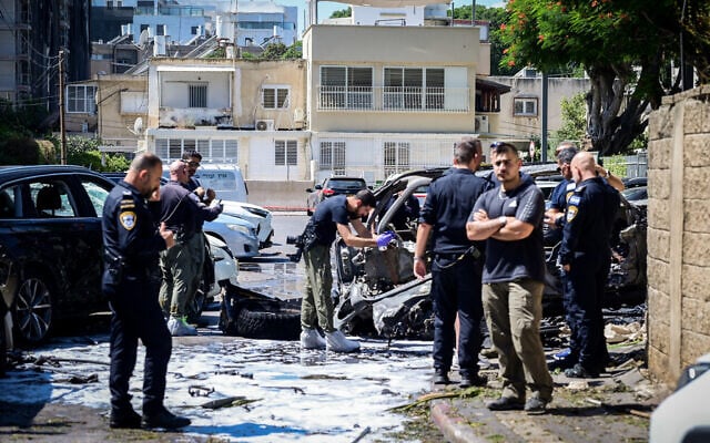 Police at the scene where a car exploded as a result of a suspected assassination, in Tel Aviv, August 30, 2025. (Avshalom Sassoni/Flash90) Police at the scene where a car exploded as a result of a suspected assassination, in Tel Aviv, August 30, 2025. (Avshalom Sassoni/Flash90)