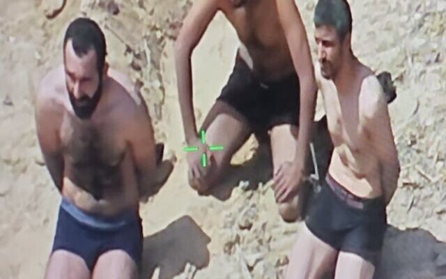 Hamas operatives surrender to IDF troops of the Givati Brigade in northern Gaza's Beit Hanoun, August 2, 2025. (Israel Defense Forces) Hamas operatives surrender to IDF troops of the Givati Brigade in northern Gaza's Beit Hanoun, August 2, 2025. (Israel Defense Forces)