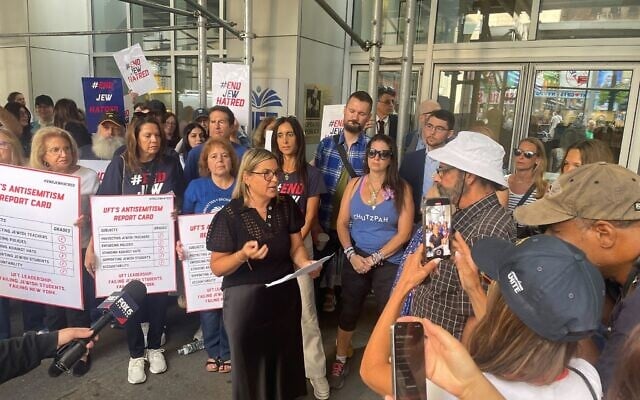Jewish educators protest outside the United Federation of Teachers in New York City, August 28, 2025. (Luke Tress/Times of Israel)