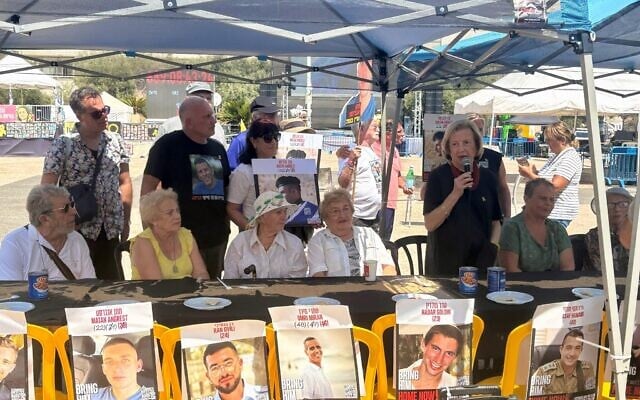 Holocaust survivor and former Israeli lawmaker Colette Avital speaks at a protest of Holocaust survivors and relatives of the Gaza hostages in Tel Aviv's Hostages Square, on August 26, 2025. (Ariela Karmel/Times of Israel)