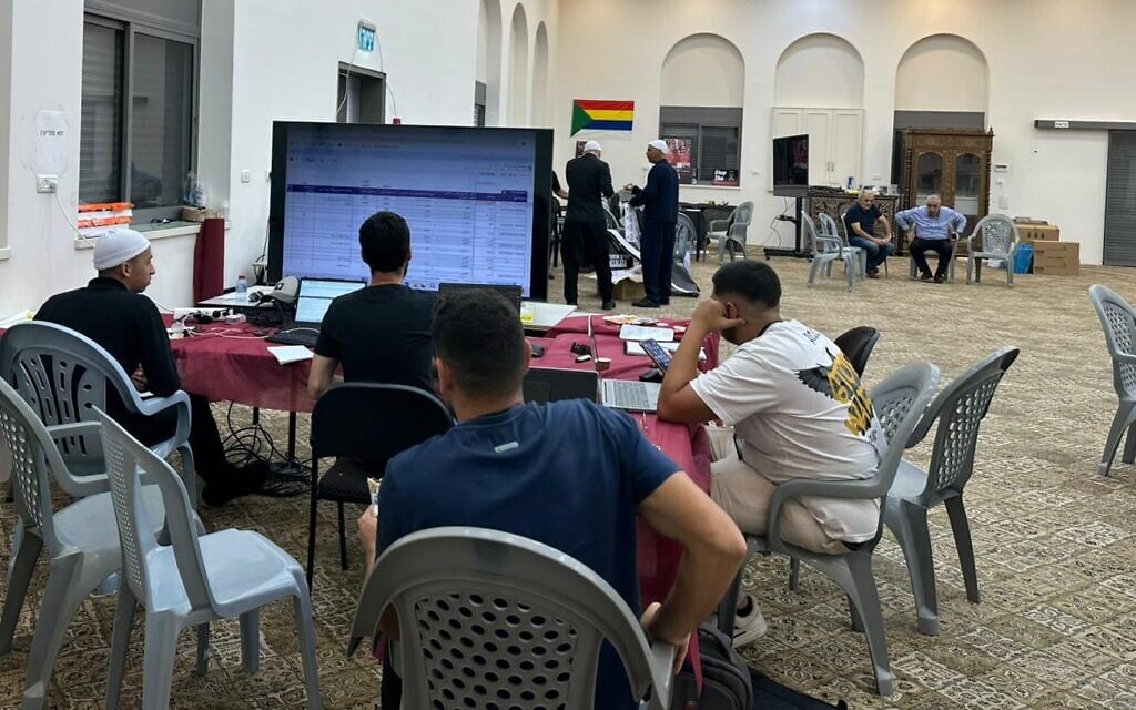 Volunteers in the war room in Julis, Galilee, who monitor the situatin for the Druze in Syria on August 6, 2025. (Courtesy/Najwa Mulla)