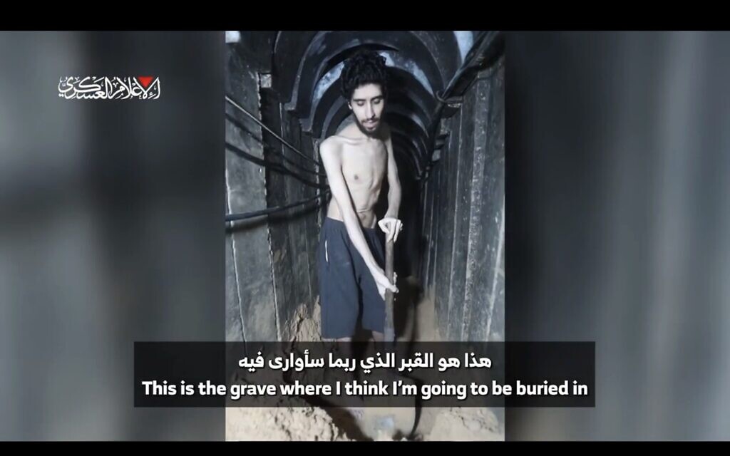 Hamas-held hostage Evyatar David filmed digging what he says he fears will be his own grave in a tunnel in Gaza, in a Hamas propaganda video that his family cleared for publication on August 2, 2025.