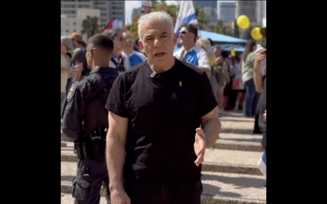 Opposition Leader Yair Lapid records a video from Hostages Square on August 17, 2025. (Screenshot/X)