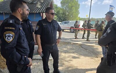 Police officers at the scene of a suspected stabbing attempt at the entrance of Kibbutz Metzer, August 2, 2025. (Israel Police)