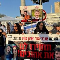 Released hostages Sharon Cunio and Arbel Yehud and Arbel’s mother Yael demonstrating for a deal to end the war in Gaza and the release of the hostages, in Jerusalem, August 7, 2025. (Ronit Shpiro/Pro-Democracy Protest Movement)