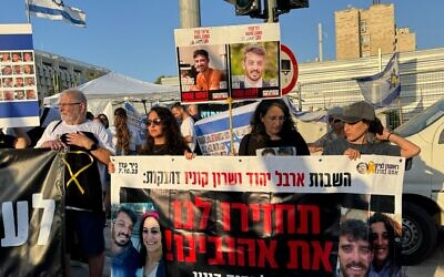 Released hostages Sharon Cunio and Arbel Yehud and Arbel’s mother Yael demonstrating for a deal to end the war in Gaza and the release of the hostages, in Jerusalem, August 7, 2025. (Ronit Shpiro/Pro-Democracy Protest Movement)