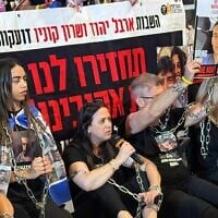 Anat Angrest, whose son Matan Angrest is held hostage in Gaza, speaks at a protest demanding a comprehensive deal to release captives, in Jerusalem, August 7, 2025. (Courtesy)