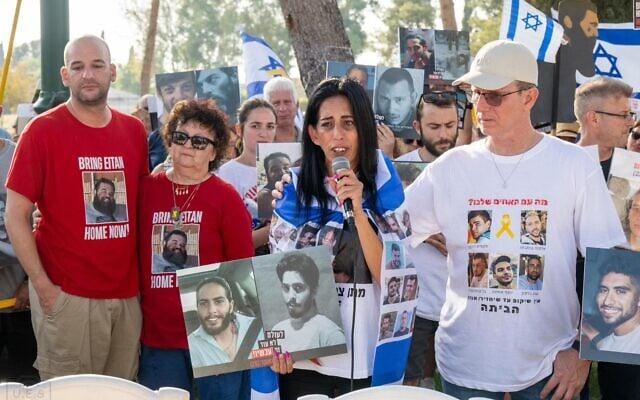Einav Zangauker, whose son Matan is held hostage in Gaza, speaks outside the home of Defense Minister Israel Katz, in Kfar Ahim, August 8, 2025. (Uriel Even Sapir/Hostages and Missing Families Forum)