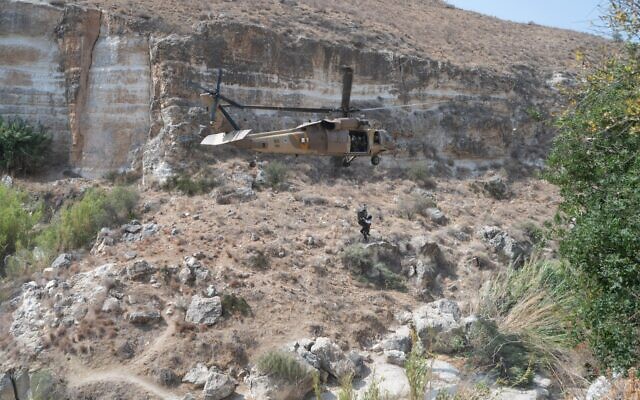 A helicopter rescues a man who suffered heatstroke at the El Al Nature Reserve in the Golan Heights on August 11, 2025. (Courtesy Golan Rescue Unit) A helicopter rescues a man who suffered heatstroke at the El Al Nature Reserve in the Golan Heights on August 11, 2025. (Courtesy Golan Rescue Unit)