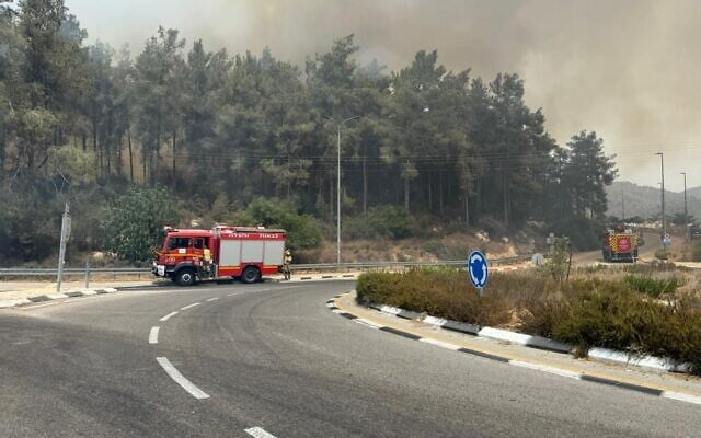 A fire engine arrives at the scene of a fire in the Judean Hills around Jerusalem, on August 12, 2025. (Courtesy/Fire and Rescue Service)