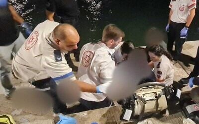 Paramedics provide first aid to a person injured by a boat propeller off the coast of Jaffa on August 16, 2025. (Magen David Adom)